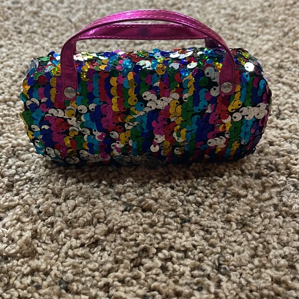 2 pair kids sunglasses and 1 case.